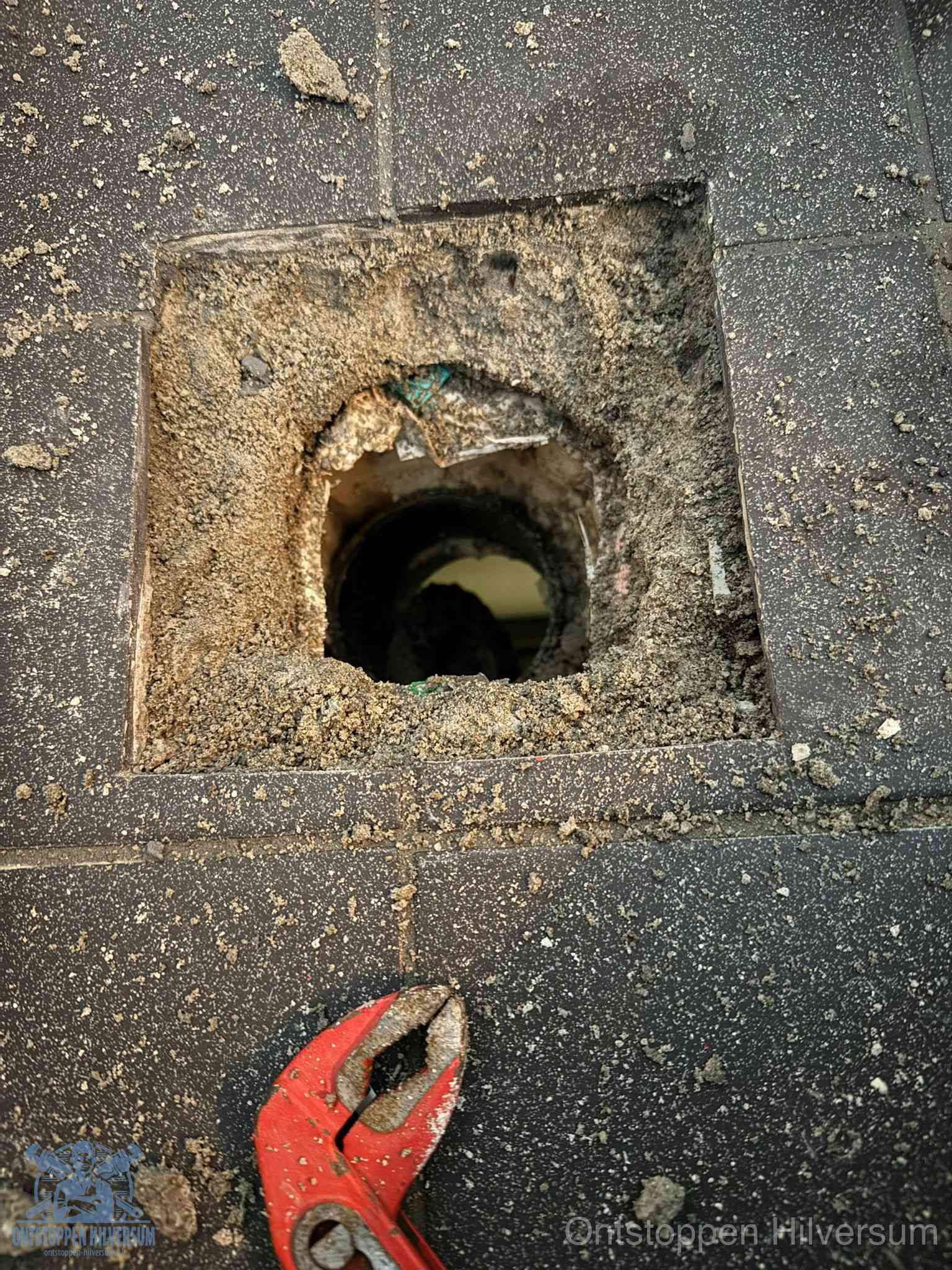 Rioolputje erfgrens eigendom in Hilversum